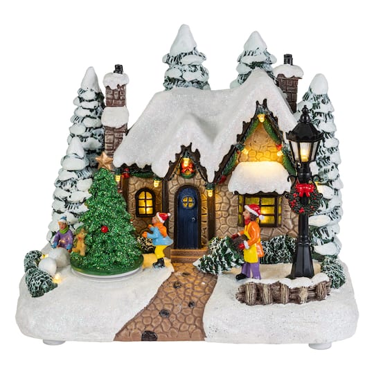 Glitzhome® 9.5" Lighted Christmas Snowy Musical Resin Village with Movement and Timer